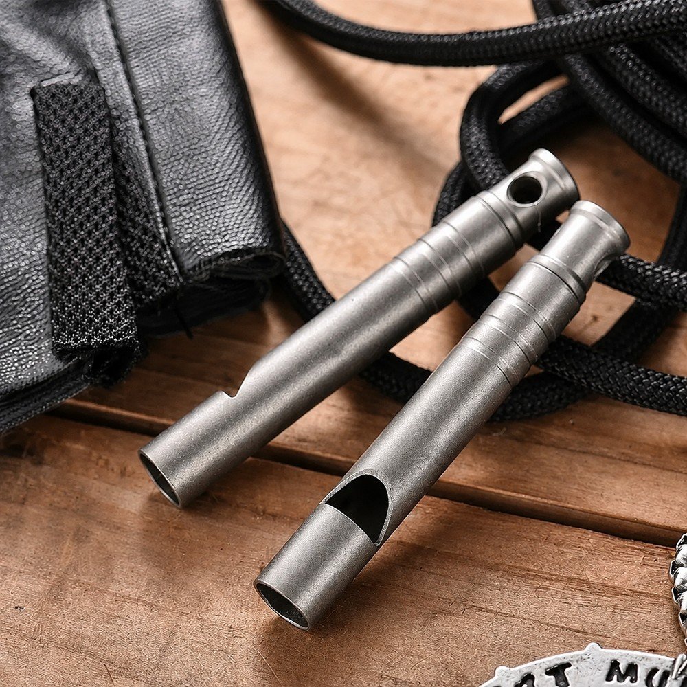 Compact Titanium Survival Whistle outdoor scene