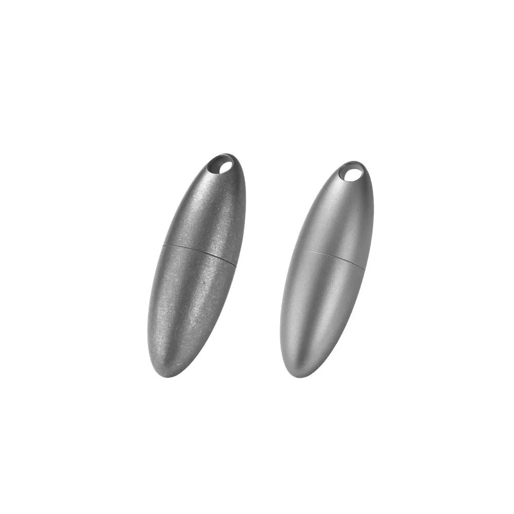 Two bullet-shaped titanium storage capsules with smooth and stonewashed finishes