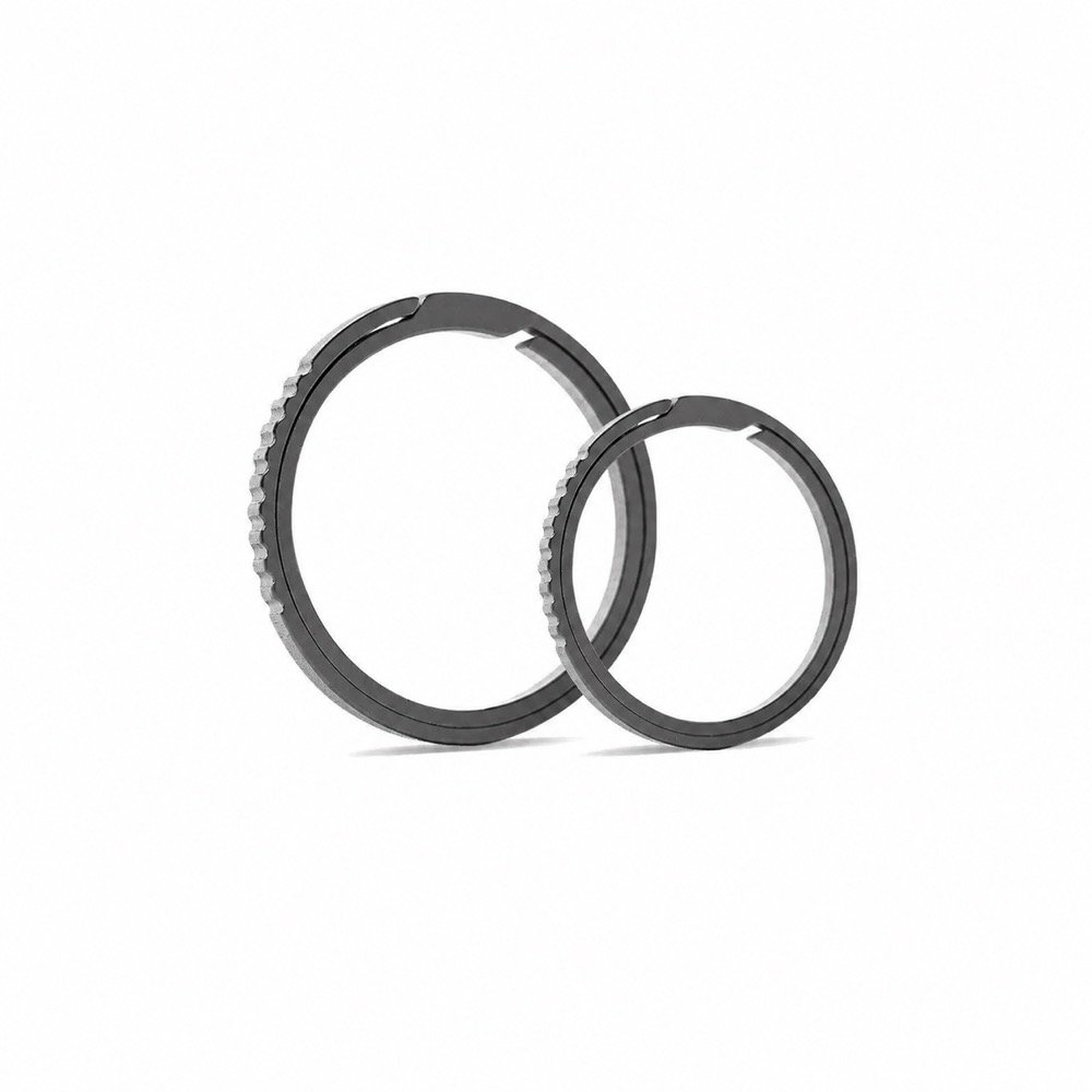 Two TC4 titanium side push key rings in large and small sizes